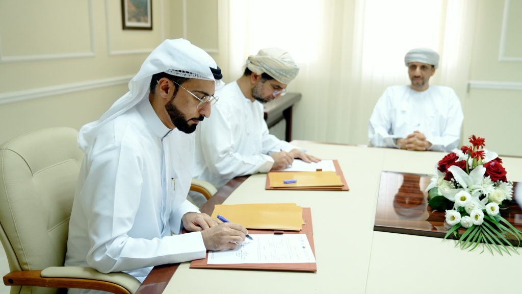 This image has an empty alt attribute; its file name is Signing-agreement-musandam-1-1024x576.jpg